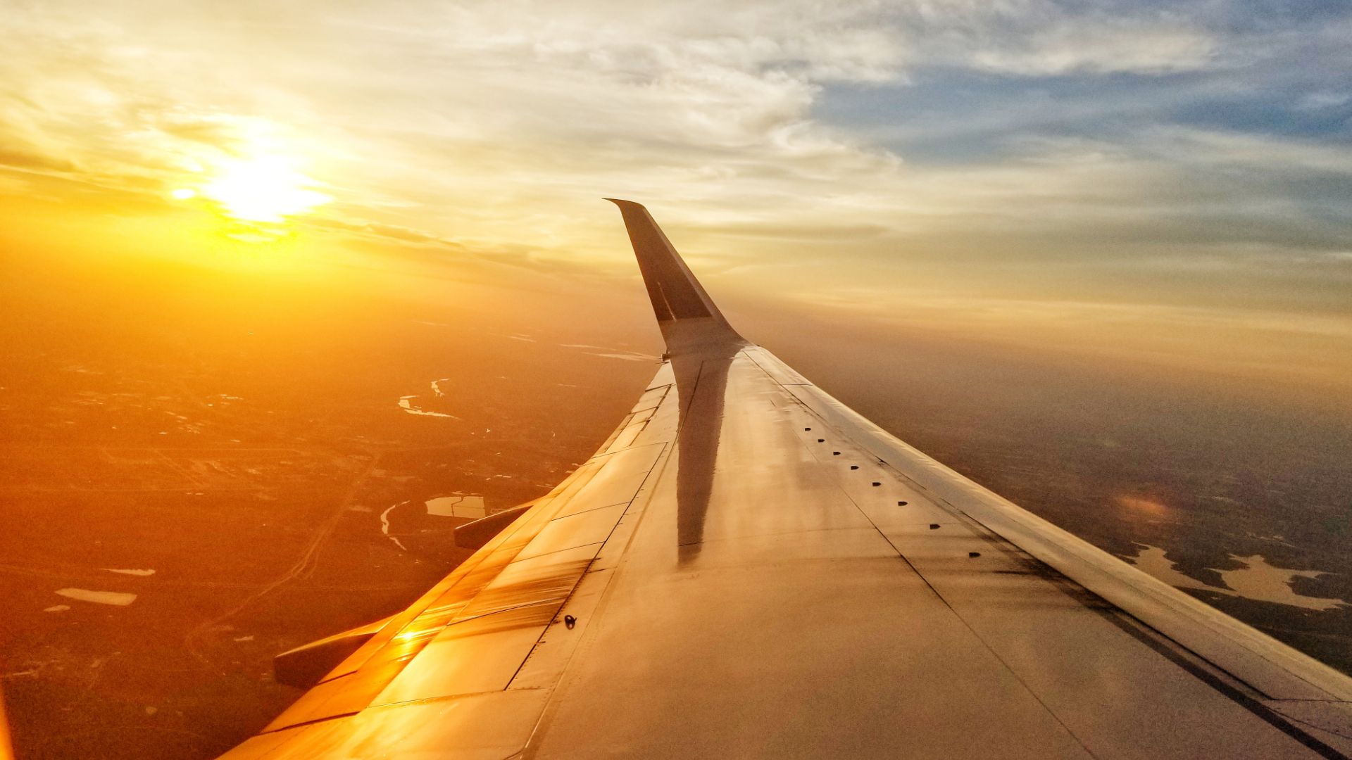 Sunset from the window of an airplane.