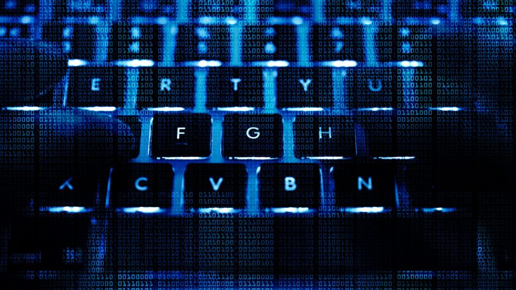 Computer keyboard with light under it.