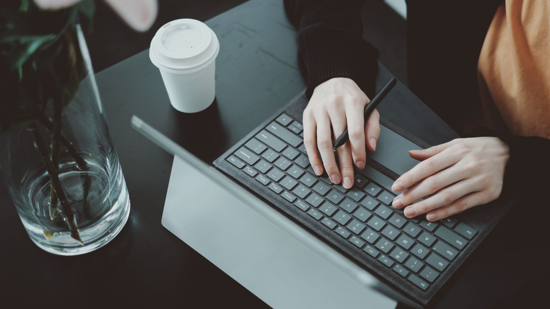 Person working on laptop.