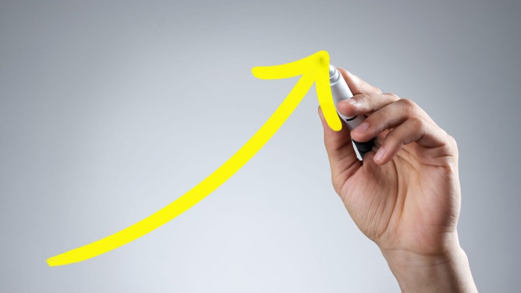 Hand drawing an arrow pointing up.